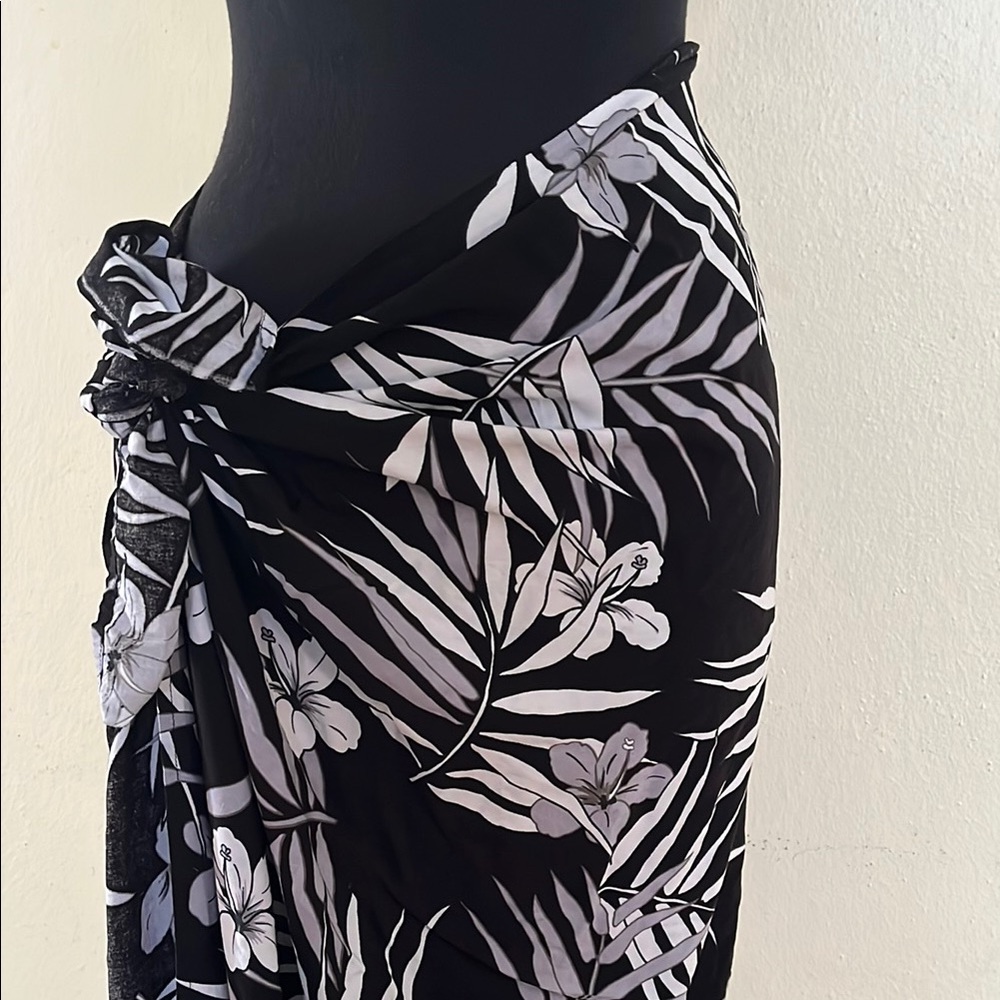 100% rayon black/white/gray sarong with hibiscus pattern roughly 58.5 by 43”